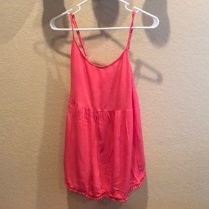 Pink romper with pompom ball fringe!